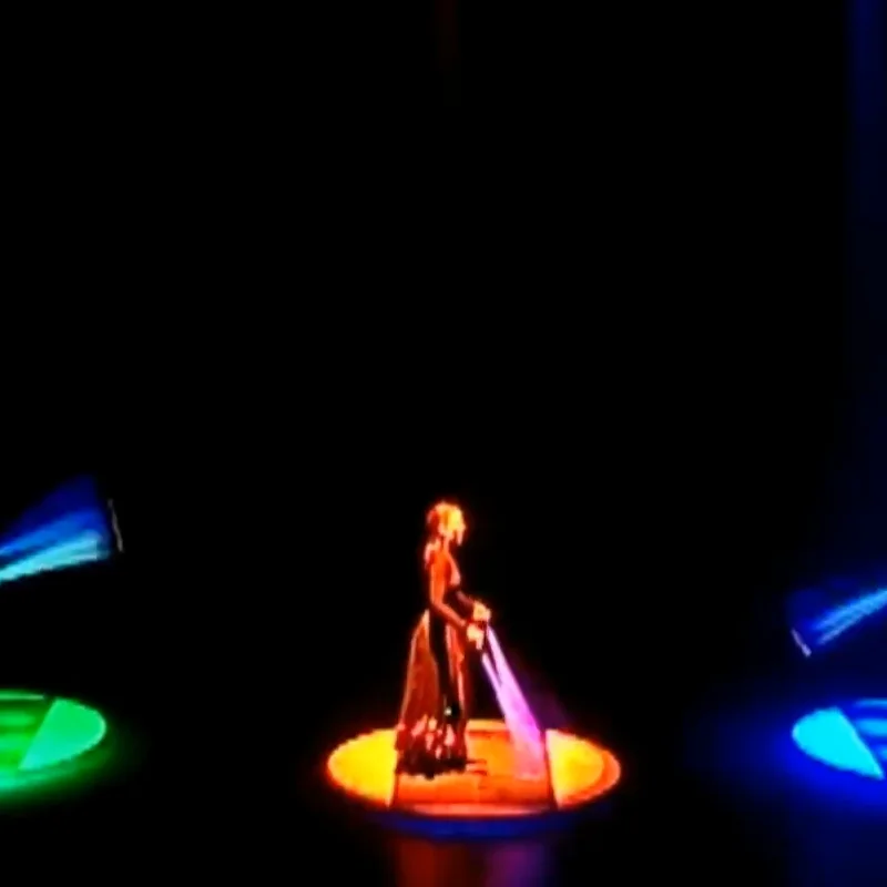 Cindy Marvell in a black light juggling act with Lazer Vaudeville
